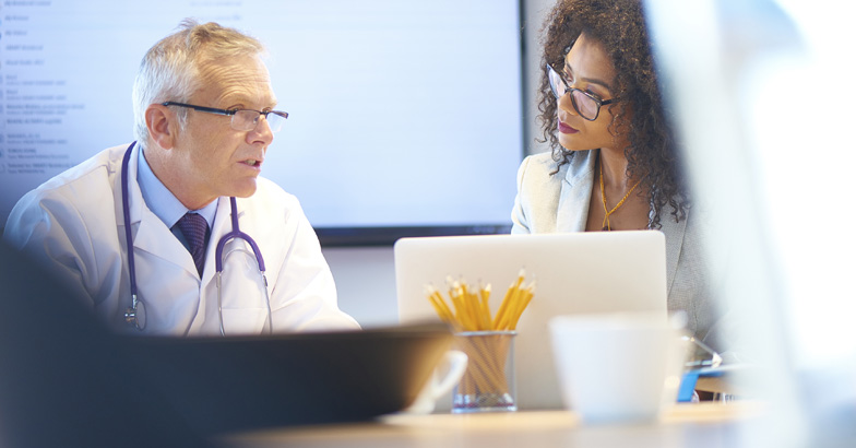 Healthcare compliance team in an audit defense strategy session