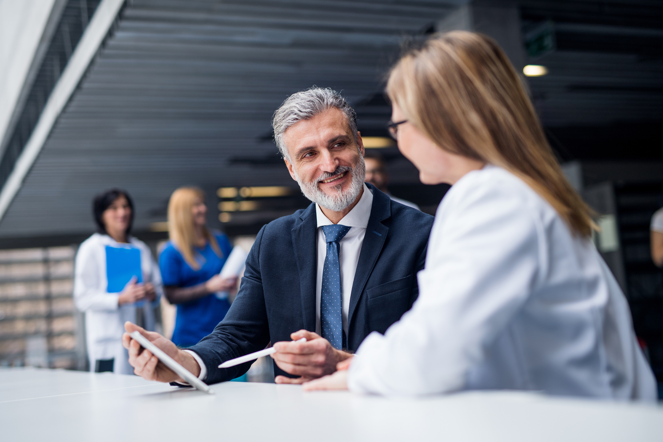 Healthcare providers reviewing revenue cycle metrics